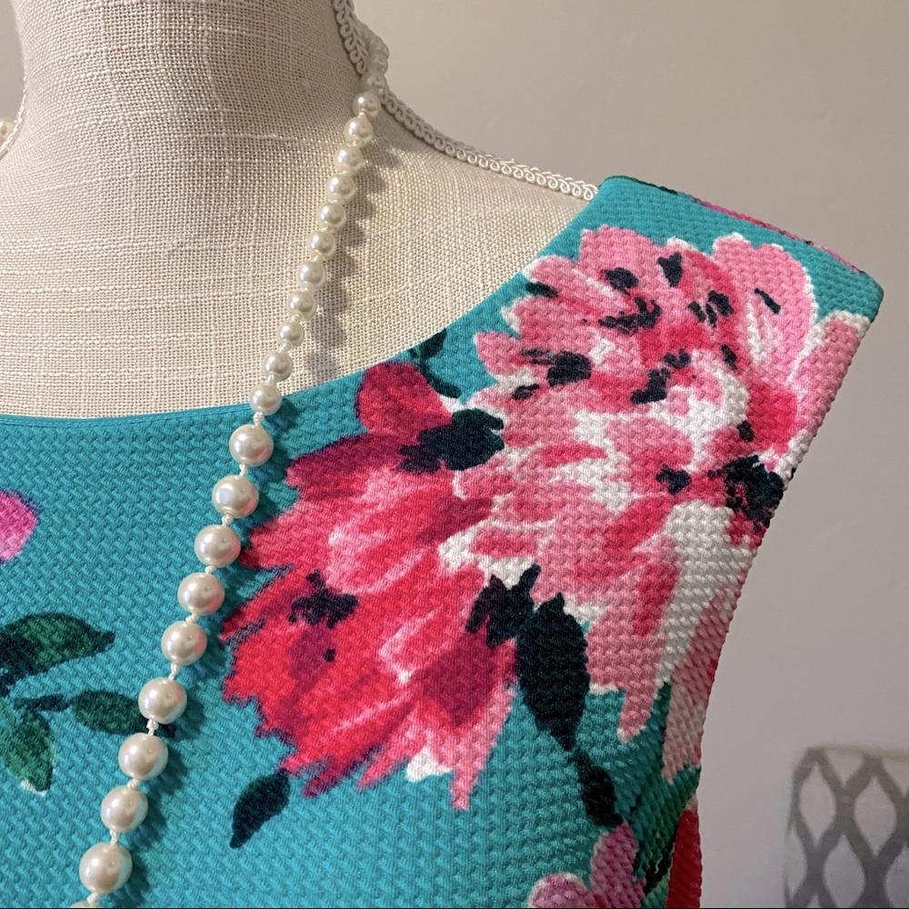 Knee length floral teal + pink fit and flare feminine dress by Jessica Howard - Picture 5 of 6